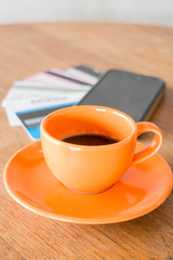 Hot coffee cup on wooden table