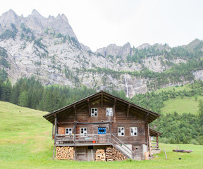 Fototapeta na wymiar Typical house in the Swiss alps
