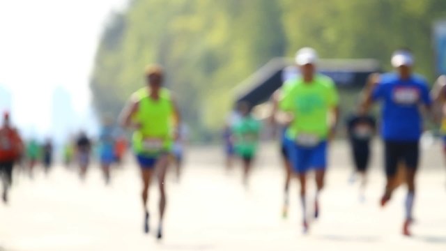 Blurred mass of a people marathon running
