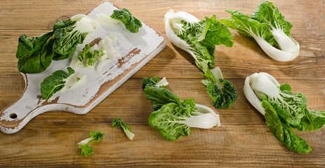 Chinese cabbage, Bok Choy on a wooden background.