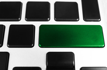 Close-up of laptop keyboard with color button