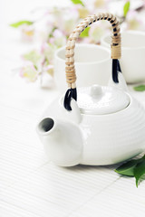Chinese Tea Set and pink sakura blossom