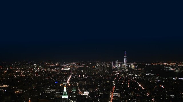 Aerial View New York City, Manhattan Cityscape by night.