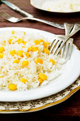 basmati rice in white plate witn sweet corn