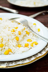 basmati rice in white plate witn sweet corn