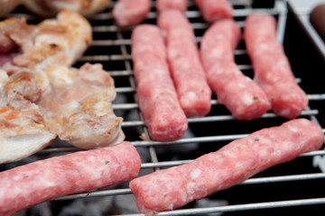 Sausages and chicken on the barbecue