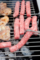Sausages and chicken on the barbecue