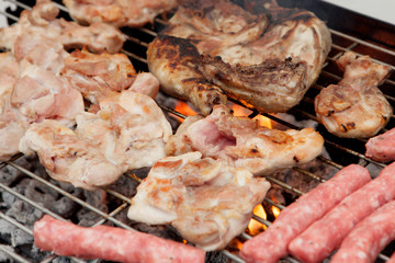 Chicken and sausages on the barbecue