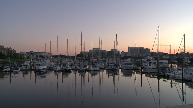 Boats docked at sunrise