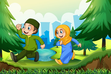 Obraz na płótnie Canvas Muslim boy and girl in the park