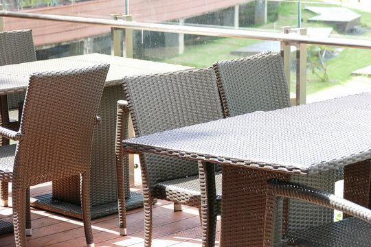 black rattan table and chair on the terrace