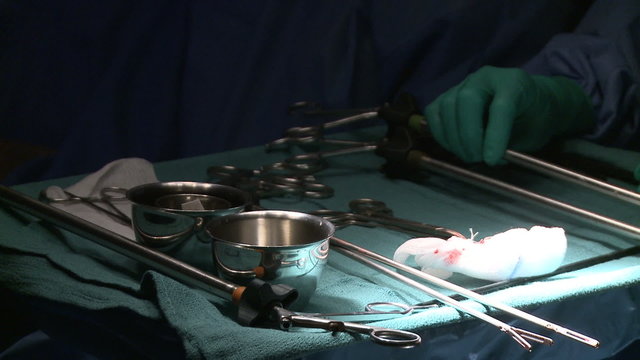 Surgeons performing surgical tasks