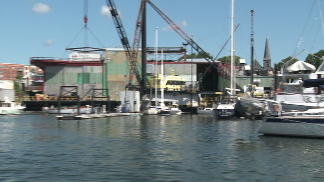 Boats docked at marina.