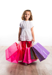 Girl with many shopping bags