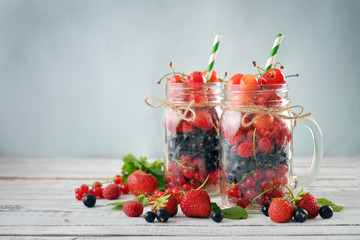 Berries in  jar with handle