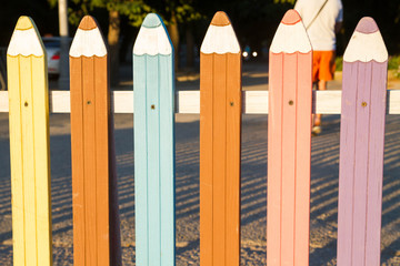 Colorful fence in the form of pencils