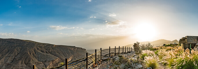 Panoramic view of Jabal Akhdar at sunset in the Al Hajar Mountains, Oman.