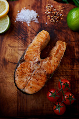 Fish steak on a wooden board