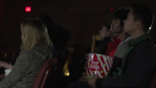 Young people watching a movie