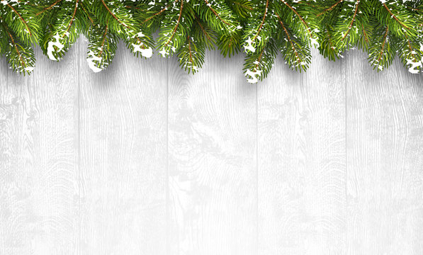 Christmas wooden background with fir branches