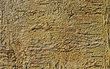 Orange decorative relief plaster on wall