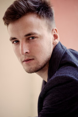 Fototapeta premium Portrait of beautiful young men closeup