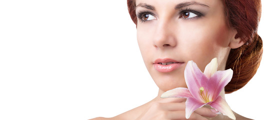 Young beautiful Women with lily flower.Hygiene female body.Skin care