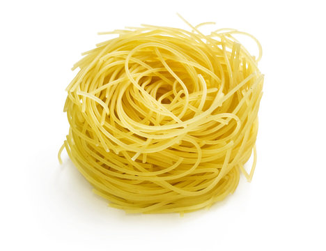 Tagliatelle pasta on white