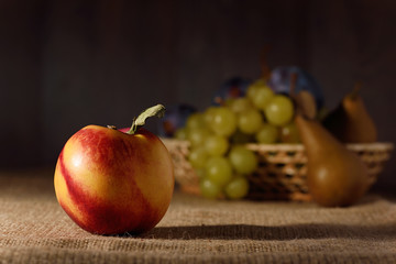 Fresh fruits on sackcloth after harvest