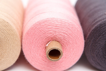 Sewing threads as a color background close up