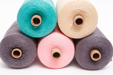 Sewing threads as a color background close up