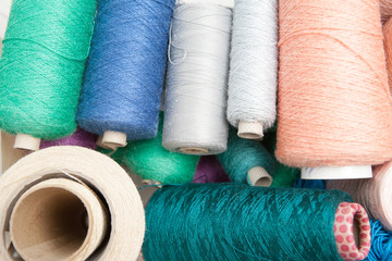 Sewing threads as a color background close up