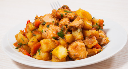 meat stew with potatoes, pepper, onion and carrot