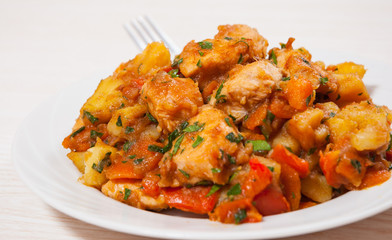 meat stew with potatoes, pepper, onion and carrot