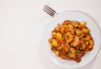 meat stew with potatoes, pepper, onion and carrot
