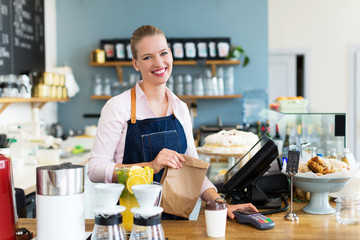 Woman working at cafe