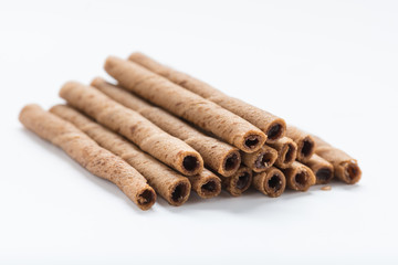 Chocolate wafer sticks isolated on white background.