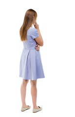 back view of standing young beautiful  woman.