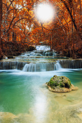 Waterfall Huay Mae Kamin, beautiful waterfall in autumn forest,