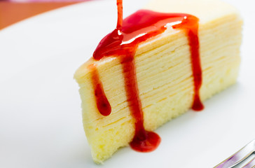 Crepe Cake with strawberry sauce
