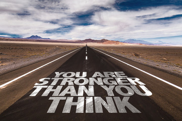 You Are Stronger Than You Think written on desert road
