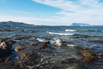 Sardinia coast in evening sunlight.