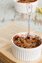 Crumble with figs and apples. selective focus.