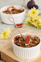 Crumble with figs and apples. selective focus.