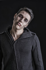 Portrait of a Young Vampire Man with Black Sweater