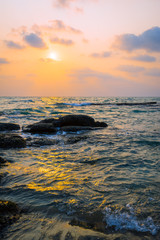 Fototapeta na wymiar Lonely sunset over the sea
