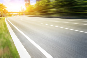 empty asphalt road in modern city