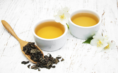 Cup of tea with jasmine flowers