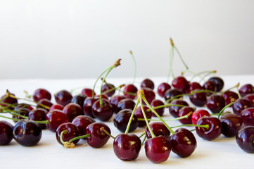 fresh cherries on wooden table
