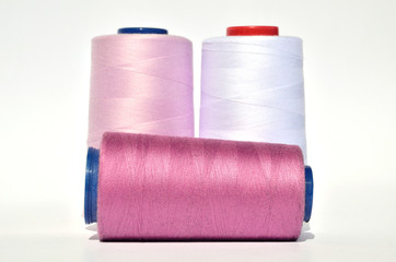 Violet pink and white thread